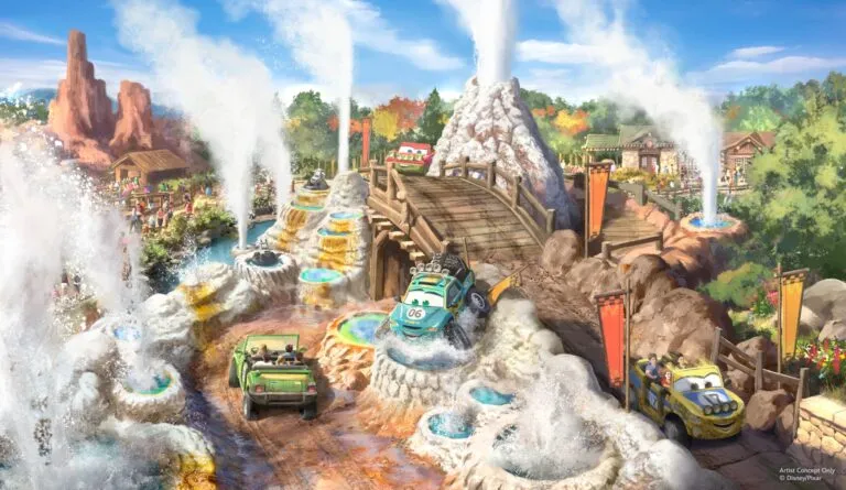 Arte conceptual de una nueva atracción de Cars con vehículos, géiseres y caminos entre montañas
